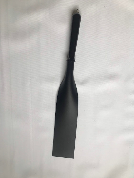 Leather paddle on oak handle photo