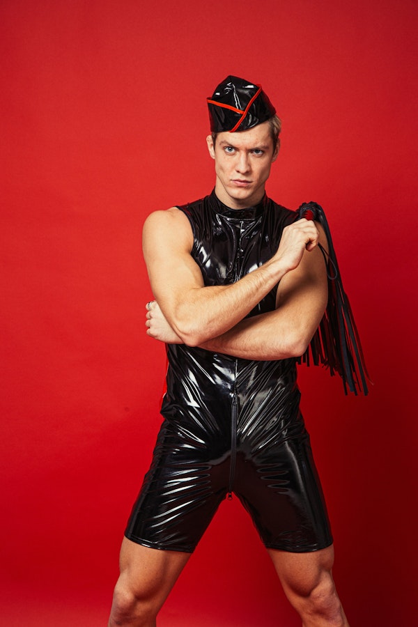 Open Butt Men's Latex Bodysuit Glossy Black Sleeveless Bodysuit with Red Side Panels and High Neck Design Athletic Entertainment Purposes Image # 143156