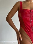 Red Vinyl Bodysuit: Dazzling Red Latex Look Sexy Red Lingerie with Mesh Detailing High-Leg Cut Closure Stretch Mesh for a Perfect Fit Thumbnail # 143220