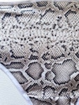 White VENUS high cut thong. Snake print V cut retro style. Wet look fabric. Handmade to order sexy woman’s lingerie in your size. Thumbnail # 173110