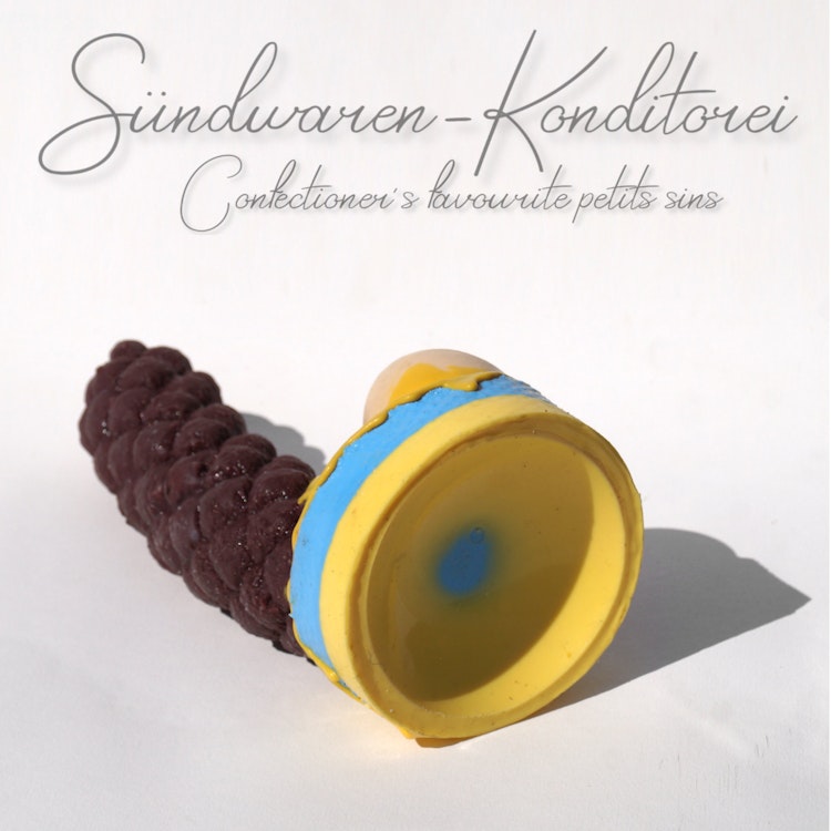Vegan Wild boar with eggs and undefined yellow sauce - handcrafted and handpainted silicone plug/dildo from Suendwaren-Konditorei photo
