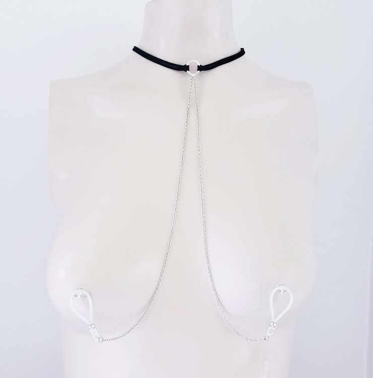 Leather Choker with Chain to Nipple Nooses. Or feel the sting with one of our five different types of nipple clamps. Mature Listing, BDSM photo