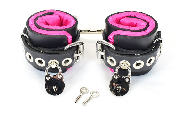 Locking Pink Satin Lined Leather Wrist Bondage Cuffs photo