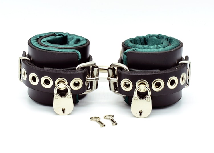 Locking Green Satin Lined Leather Wrist Bondage Cuffs photo